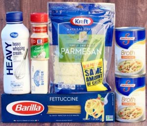 Fettuccine Alfredo ingredients including garlic powder, butter, and heavy whipping cream.