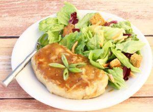 Crockpot Smothered Pork Chops Recipe at TheFrugalGirls.com