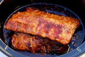 Honey Garlic Ribs with sauce in a Crockpot.
