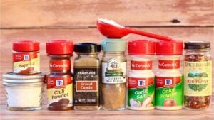 Seasonings including chili powder, cumin, and garlic salt.