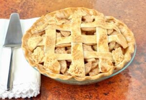 Baked apple pie on a countertop.