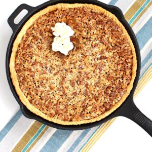 Baked Southern Pecan Pie in cast iron skillet.