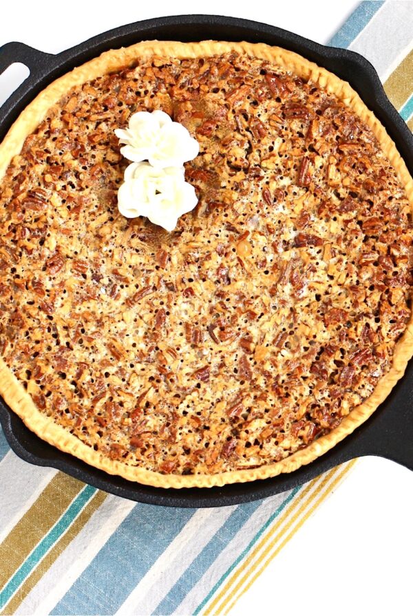 Baked Southern Pecan Pie in cast iron skillet.