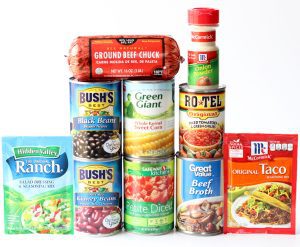 Taco soup ingredients including beef broth, diced tomatoes, and onion powder.