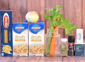 Chicken Noodle Soup ingredients including carrot, celery, and onion.