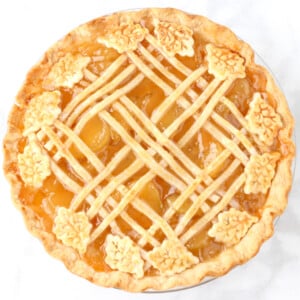 Cooked caramel apple pie with lattice crust.
