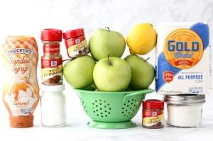 Caramel apple pie ingredients including lemon, nutmeg, and allspice.