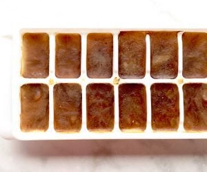 Frozen coffee in an ice cube tray.