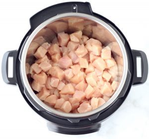 Diced chicken in an Instant Pot.