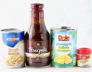 Hawaiian Pork Chops ingredients including chicken broth, sesame seeds, and pineapple tidbits.