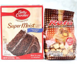 Bag of Rolo and box of chocolate fudge cake mix.