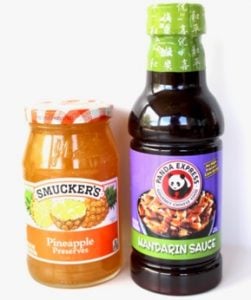 Jars of Mandarin sauce and pineapple preserves.