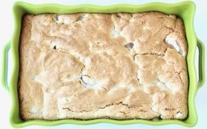 Apple Cinnamon Angel Food Cake in a green baking pan.