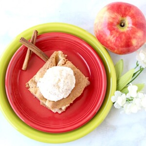 Slice of Apple Angel Food cake on red and green plates.