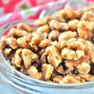 Spiced walnuts in a mason jar.