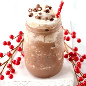 Hot Chocolate topped with whipped cream and chocolate shavings.