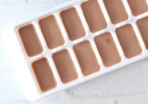 Hot chocolate in an ice cube tray.