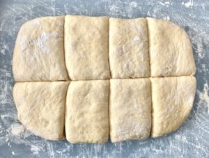 Dough cut into eight equal parts.