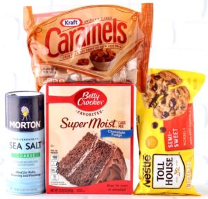 Chocolate sea salt caramel cookie ingredients including chocolate chips, caramels, and chocolate fudge cake mix.