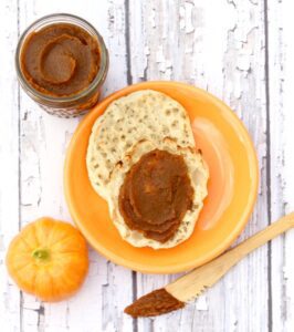 Pumpkin butter spread on an English muffin.