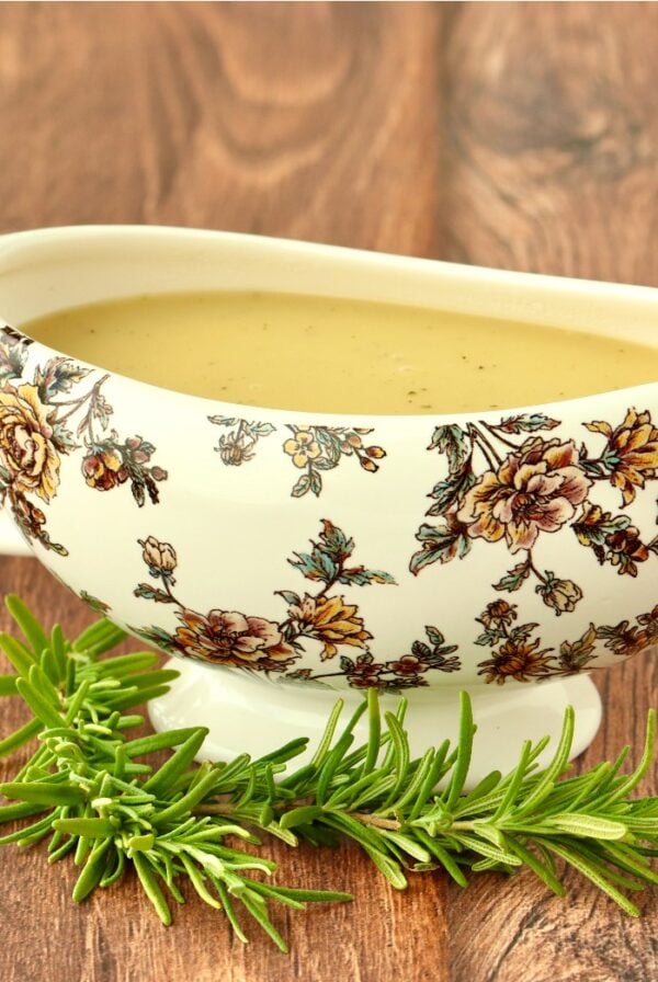 Chicken gravy in decorated gravy boat.