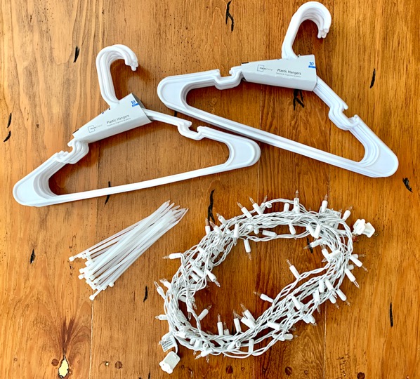 https://thefrugalgirls.com/wp-content/uploads/2022/01/How-Do-You-Make-a-Snowflake-Out-of-Plastic-Hangers.jpg