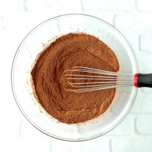 Whisk in a bowl of cocoa powder.