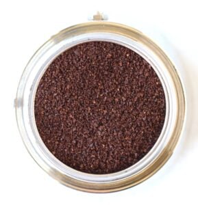 Container of coffee grounds.