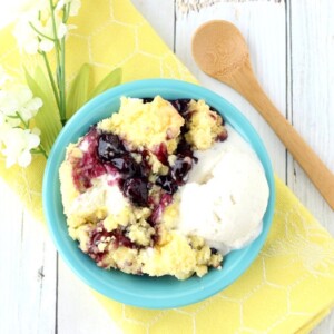 Lemon Blueberry Cobbler in a blue bowl.