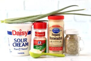 Horseradish sauce ingredients arranged in a row.