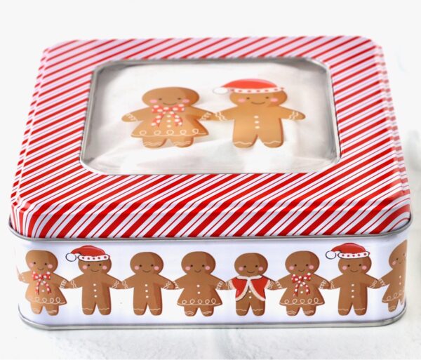 Cookie tin decorated with gingerbread men.