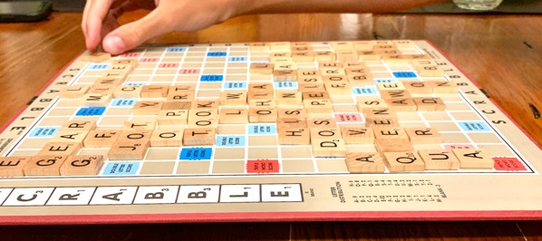 People playing Scrabble.
