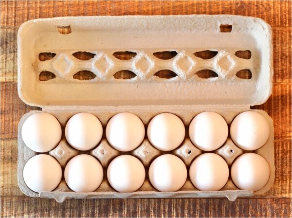Carton of a dozen eggs.