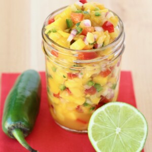 Mango Pineapple Salsa in a glass jar.