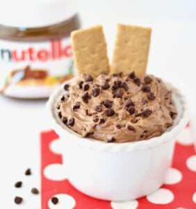 Nutella Whip Dip in a small bowl with crackers.