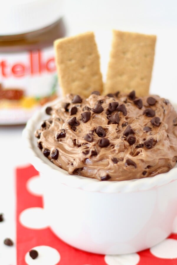 Nutella Whip Dip in a small bowl with crackers.