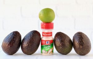 Avocados, garlic salt, and a lime.