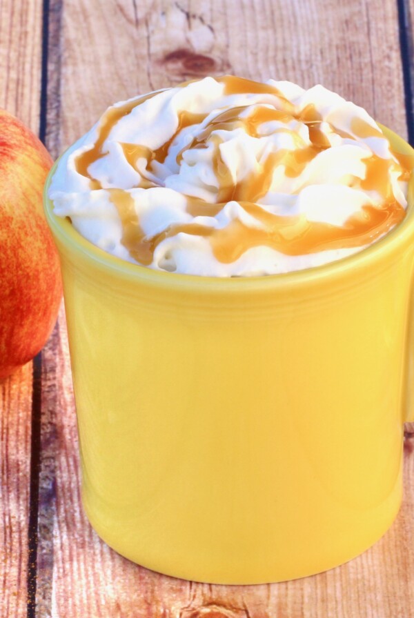Caramel Apple Cider in a yellow mug.