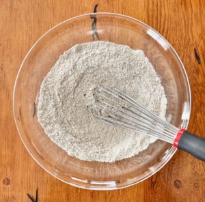 Whisk in a bowl of dry ingredients.