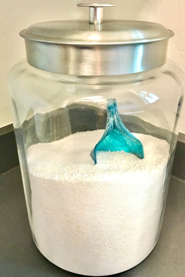 Scoop in a jar of laundry detergent.