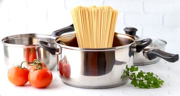 Uncooked noodles in a pot.