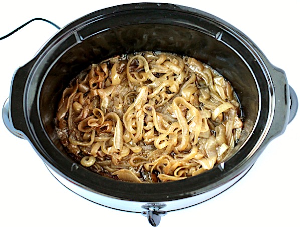 Cooked caramelized onions in slow cooker.