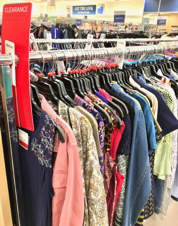 Clothing rack with clearance sign at Marshalls.