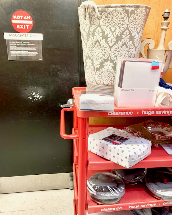 TJ Maxx clearance rack in back of store.