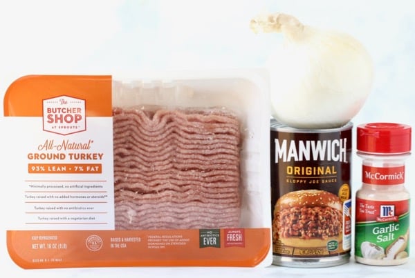 Ingredients for Ground Turkey Sloppy Joes including onion, garlic salt, and Manwich.