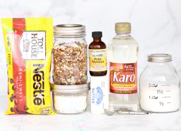 Chocolate pecan pie ingredients including vanilla, butter, and Karo syrup.