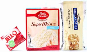 Cherry cookie ingredients including white cake mix, white chocolate chips, and cherry jello.