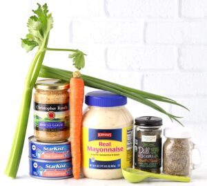 Salmon sandwich ingredients including mayonnaise, celery, and garlic.