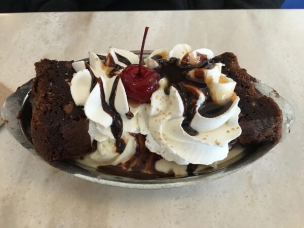 Ghiradelli brownie with whip cream and cherry on top.
