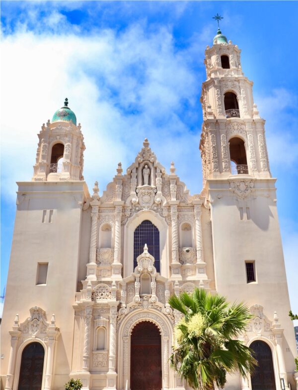 Mission San Francisco de Asis against a blue sky.